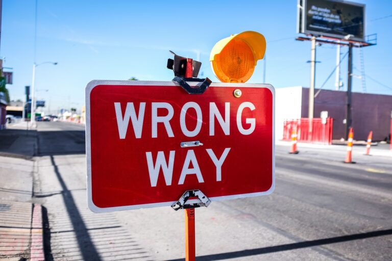 Outsourcing mistakes - a wrong way board sign