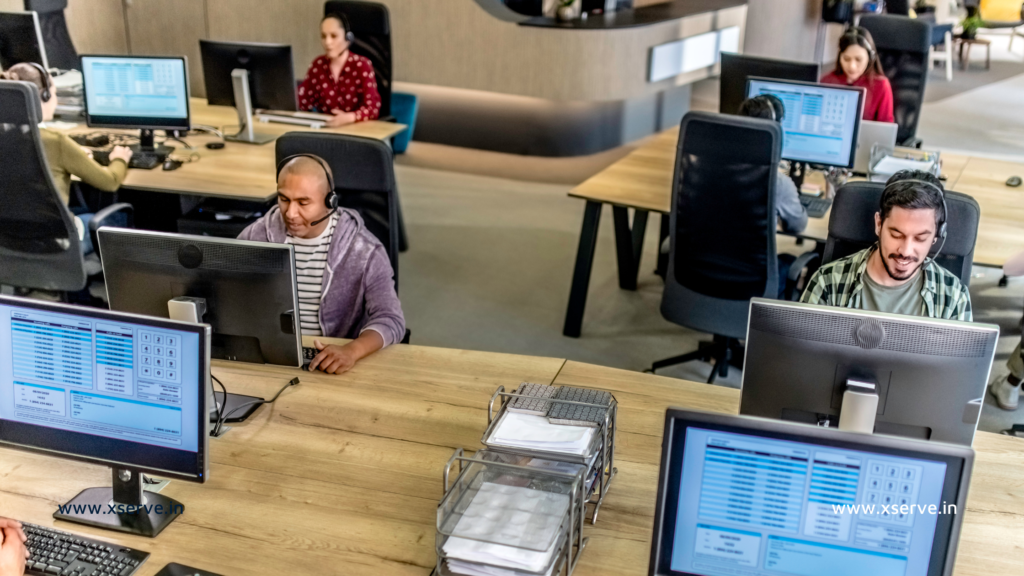 People working in a small call center.